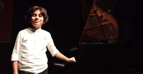 4 yaşında piyano çalmayı öğrenen Ali ödüle doymuyor