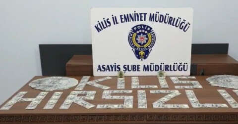 Çaldığı 38 bin dolar ile birlikte yakalandı