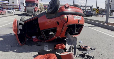 Takla atan otomobilden burnu bile kanamadan kurtuldu