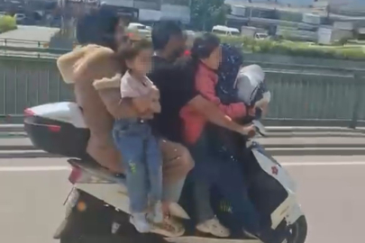 Bursa’da motosiklete 5 kişi binen aile yürekleri ağza getirdi
