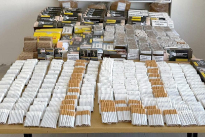 Kaçak tütün ve 65 adet sigara sarma makinesi ele geçirildi