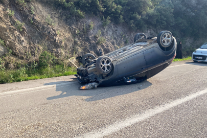Bursa'da kayalara çarpan otomobil takla attı