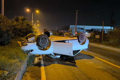 Takla atarak, ters dönen otomobilin sürücüsü yaralandı