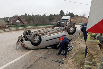 Takla atan otomobilden yara almadan kurtuldu
