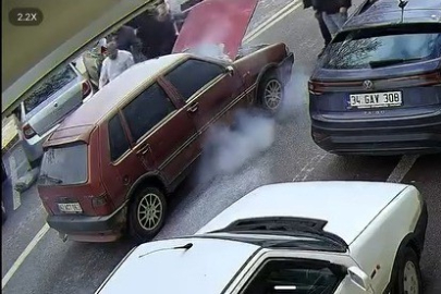 Korkutan araç yangınına esnaftan hızlı müdahale