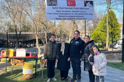 Şehitler için mevlit şekeri dağıttı