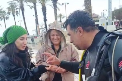 Denize düşen evlilik yüzüğünü dalgıçlar çıkardı