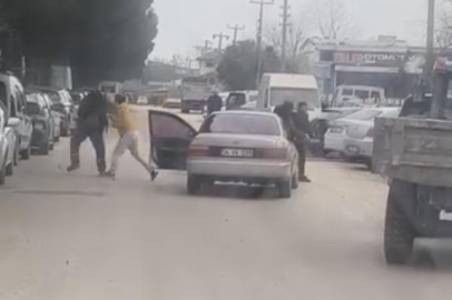 Bursa'da yol ortasında yumruklu kavga