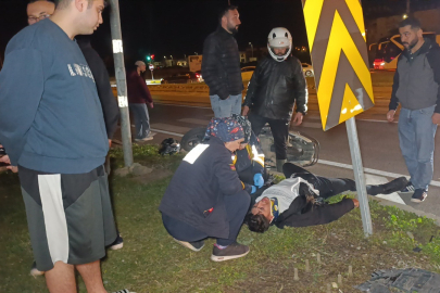 Otomobil ile çarpışan motosikletli acı içinde yerde kaldı