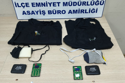 Ehliyet sınavına kopya düzeneği ile giren iki kardeş yakalandı