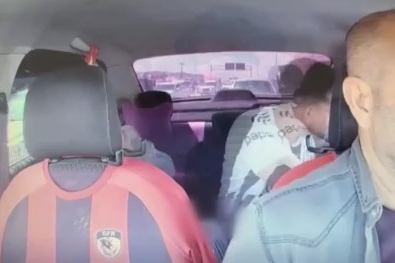 Rehin alınan taksicinin cesur müdahalesi kamerada
