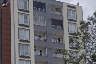 Balkondan kendini sarkıttı, ekipler harekete geçti