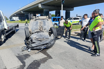 Ters dönen araçtan burnu bile kanamadan çıktı