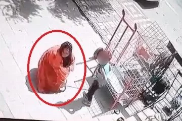 Bursa'da dükkan önünde duran köpeği önce sevdi sonra çaldı